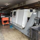 Preiswerte TRAUB TNC 65 DGY mit TOP Stangenlader kaufen | Asset-Trade